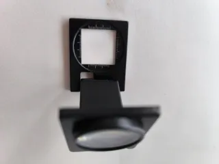 Lupa plegable con regla