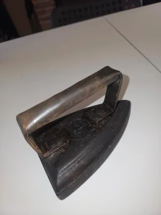 Plancha antigua de hierro macizo para brasero