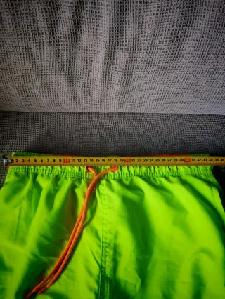 Nuevo Bañador fluorescente talla XS.