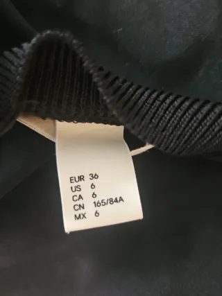 Blusa HM negra fluida tipo bomber T.36