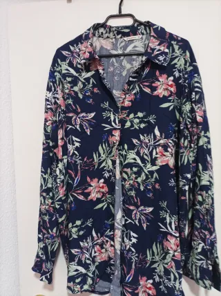 Blusa floral azul talla 48