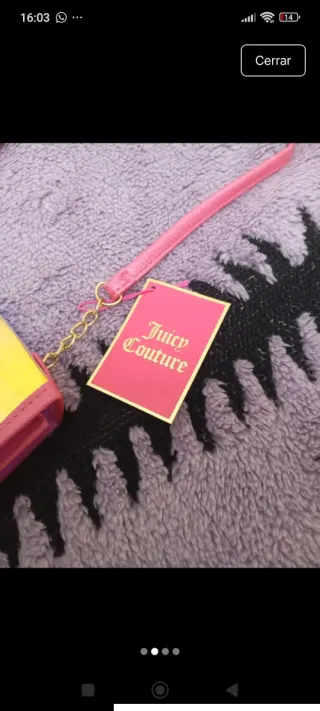 Bolso Juicy Couture transparente con etiqueta