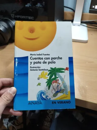 Libro cuentos con parche y para de palo