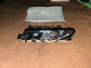 Emblema VW Golf R32 V Delantero Original