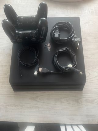 PS4 Pro + 2 Mandos + Soporte de Carga + Cables