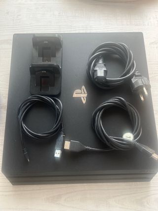 PS4 Pro + 2 Mandos + Soporte de Carga + Cables