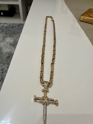 Cadena de oro 14k con colgante cruz.60gramos