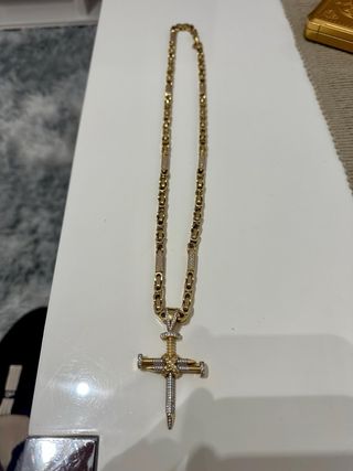 Cadena de oro 14k con colgante cruz.60gramos