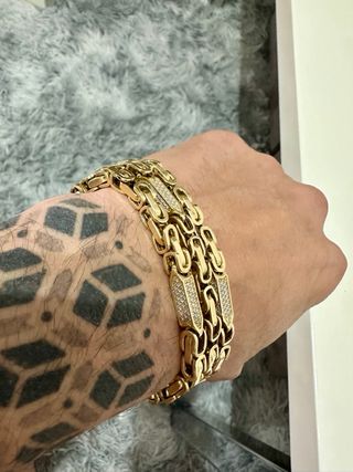 Cadena de oro 14k con colgante cruz.60gramos