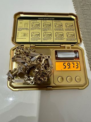 Cadena de oro 14k con colgante cruz.60gramos