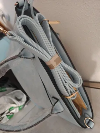 Bolso floral con lazo azul