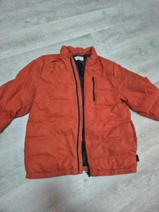 Plumífero niño naranja