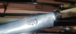 Antiguos cubiertos de mesa