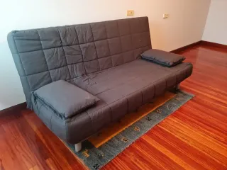 Sofá cama de tela gris