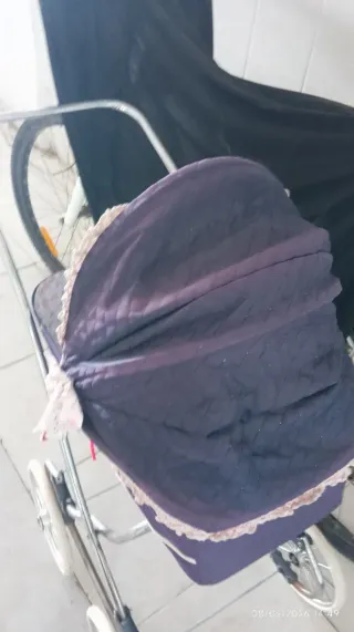 Cochecito de juguete azul