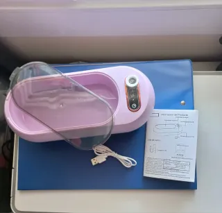 Máquina de limpieza de gafas multi-funcional.