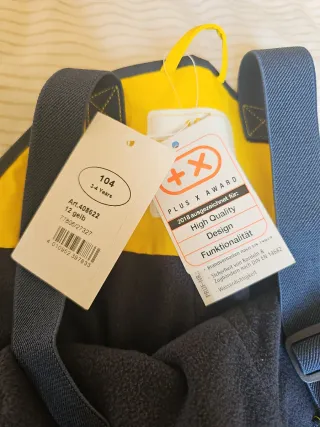 Peto impermeable amarillo para nieve