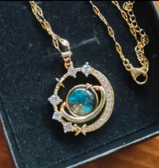 Colgante acero diseño planeta y estrellas