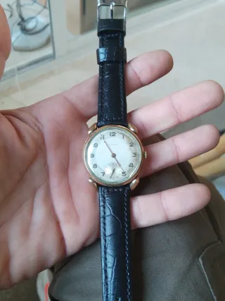 Reloj CYMA Clásico Dorado Correa Negra 1943 ww11