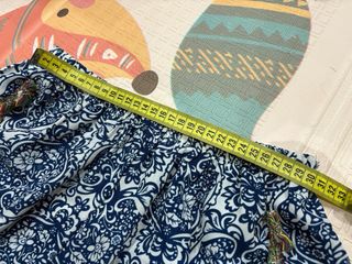 Shorts playeros talla S-M con flecos