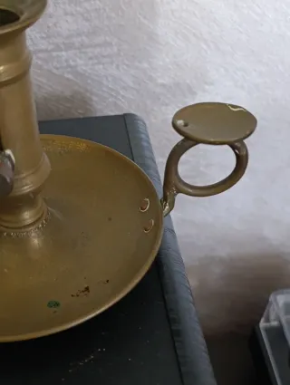 Antico portacandele in metallo dorato