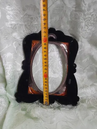 Cornice in peltro rosa e argento