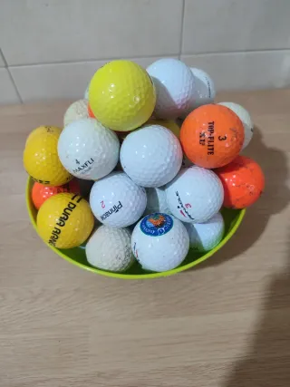 50 pelotas de golf variadas