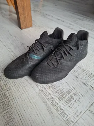 Botas de fútbol Kipsta negras y turquesa