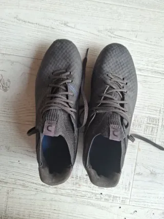 Botas de fútbol Kipsta negras y turquesa