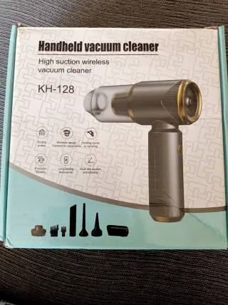 Aspirador de mano negro y dorado