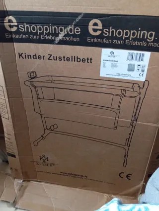 Cuna de bebé gris con estrellas regalo saca leche