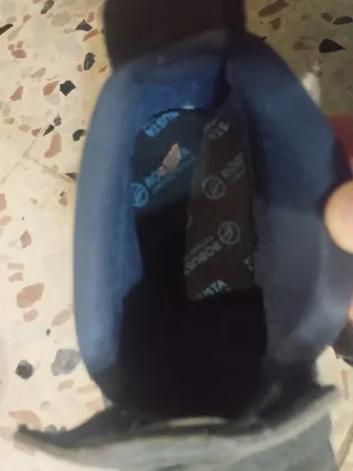 Botas de fútbol Nike moradas y verdes