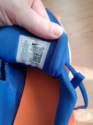 Zapatillas Nike niño azules y naranjas