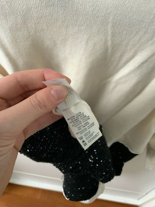 Maglioncino con paillettes beige e nere