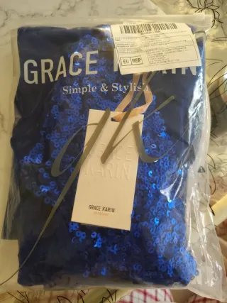 Mono niña lentejuelas azul talla 7 años