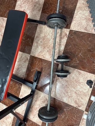 Barra + 40kg y Mancuerna 15kg
