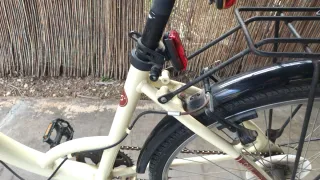 Bicicleta de paseo color crema