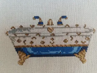 Tira bordada a mano.