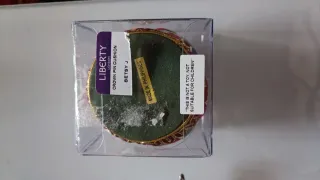 Puntaspilli decorato a forma di corona