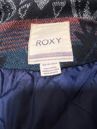 Abrigo azul de paño con detalles