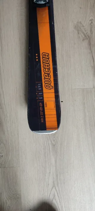 Esquís Quechua con fijaciones y bastones