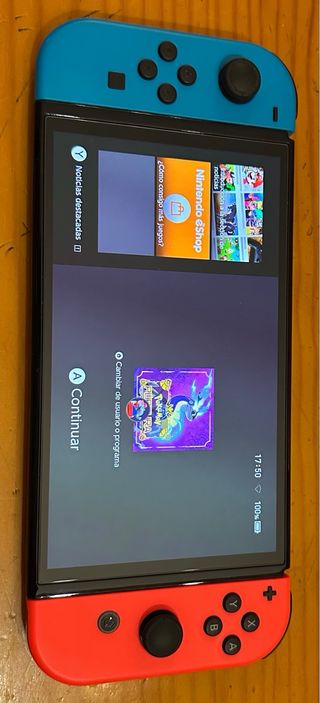 Nintendo Switch OLED neon + 6 Giochi + Accessori