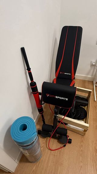 Banco de pesas y accesorios gimnasio