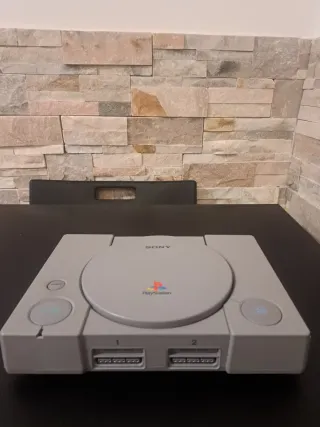 Playstation 1 Gris + Mando + Funda