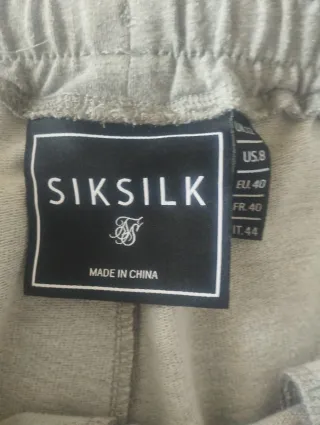 Pantalón Jogger SikSilk Gris y Rosa unisex