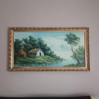 Cuadro paisaje casa y río