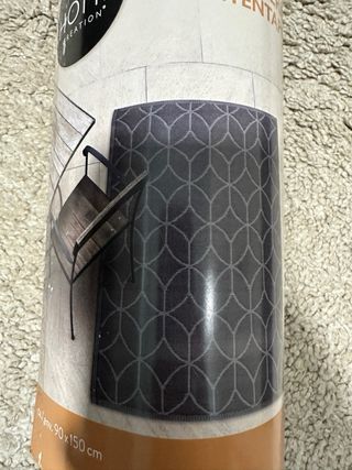 Alfombra exterior gris y negra