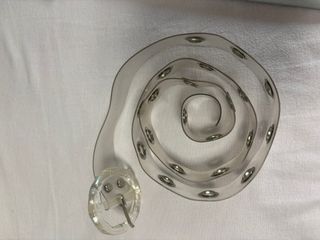 Cinturón transparente anillas plateadas