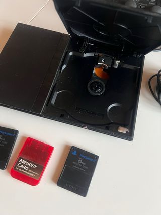 PS2 Slim Nera + Controller + 3 Schede di Memoria + Eyetoy