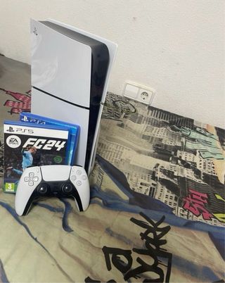 Consola PS5 con mando y juegos